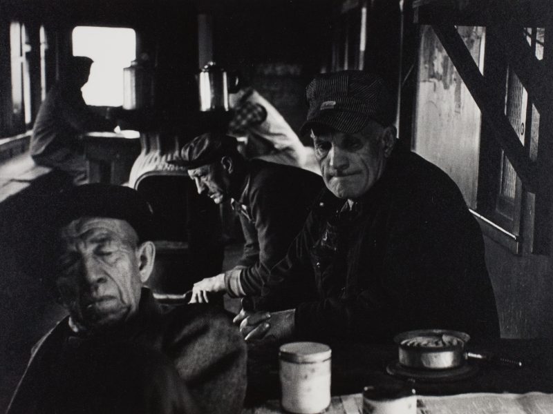 Simpson Kalisher, A Yard Crew Keeps Warm and Waits Between Jobs in a Converted Car in the Yard, c. 1957